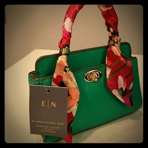 Luxury Vegan handbag with silk wrapped handle